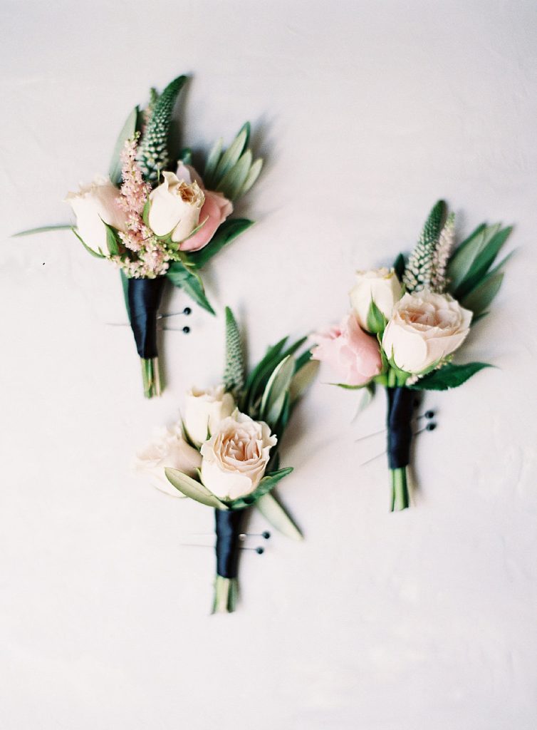The Importance Of Wedding Boutonnieres - poshpeony.com
